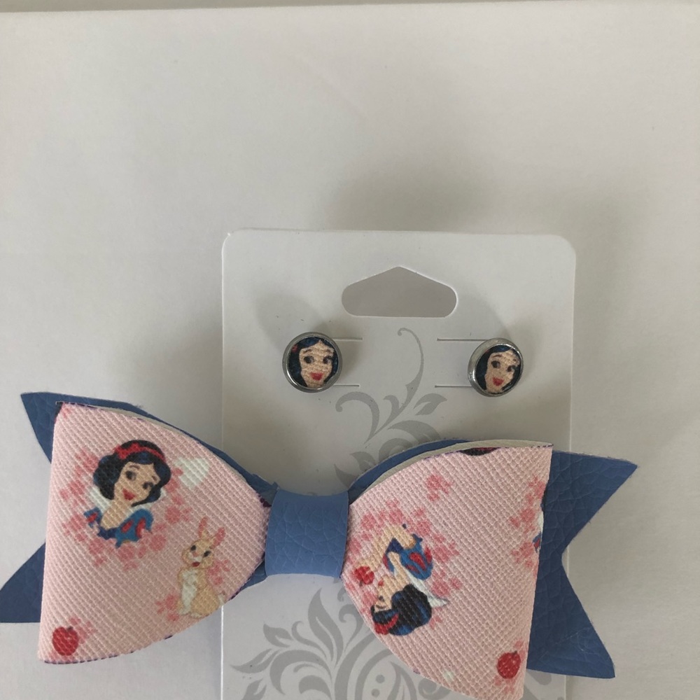 Faux leather Snow White bow and faux leather studs.